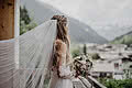 Bride during her wedding in the mountains in the restaurant at Der Schwarzacher 